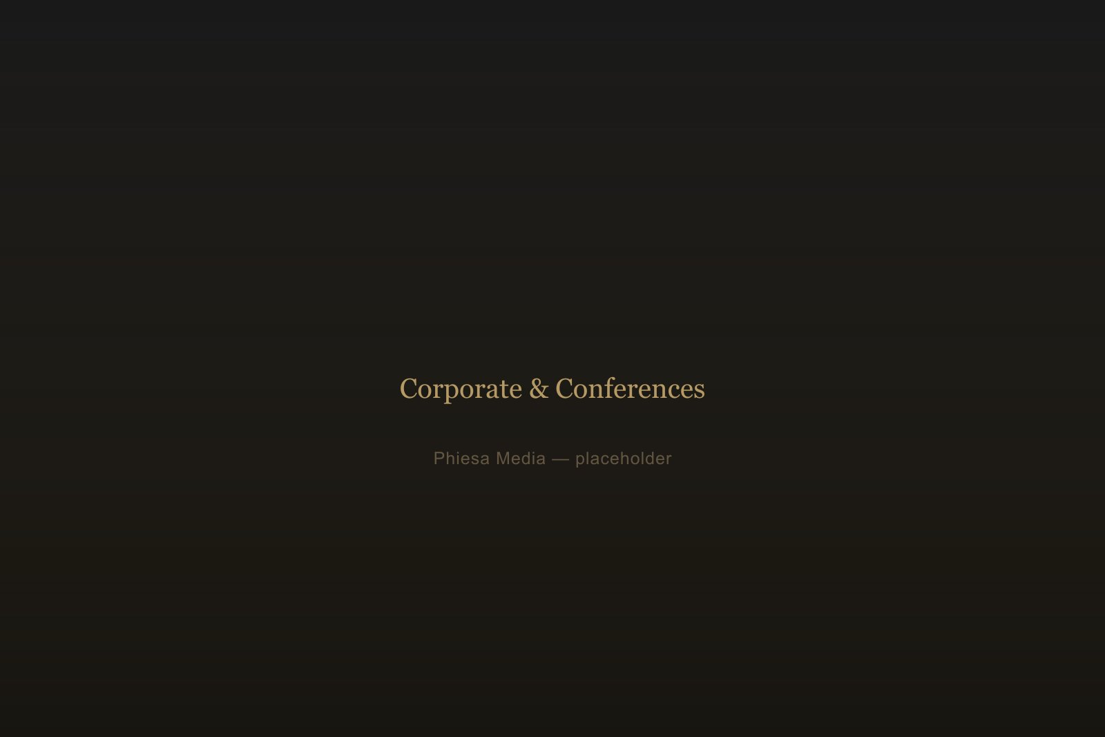 Speaker on stage at a corporate conference, audience in foreground